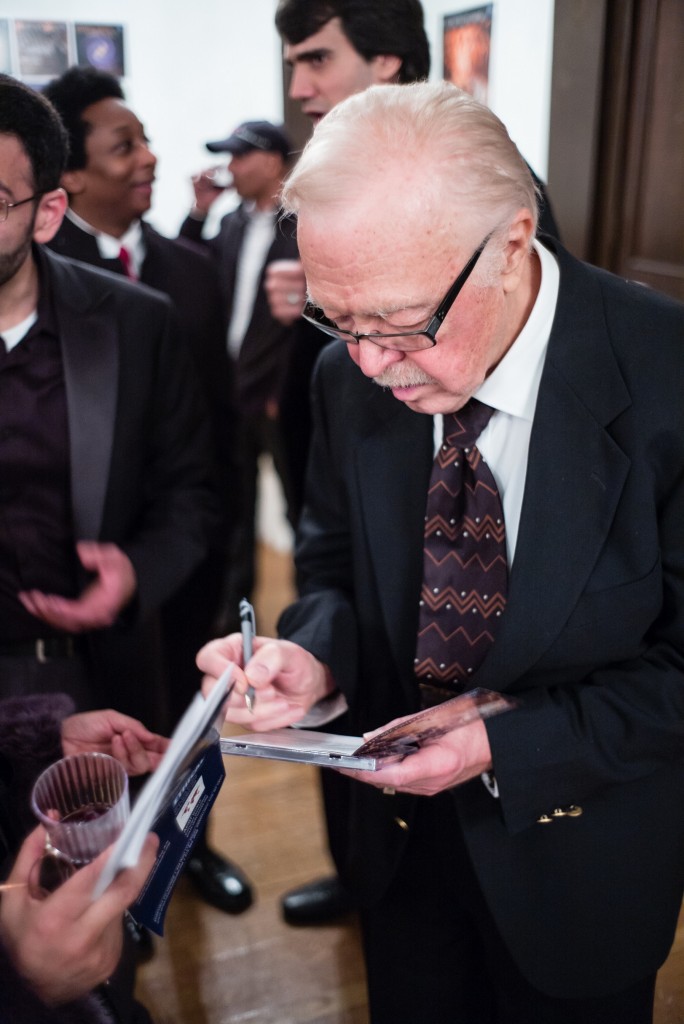 Hampson Sisler is signing CDs after the World Premiere of the Oratorio The Second Coming .
